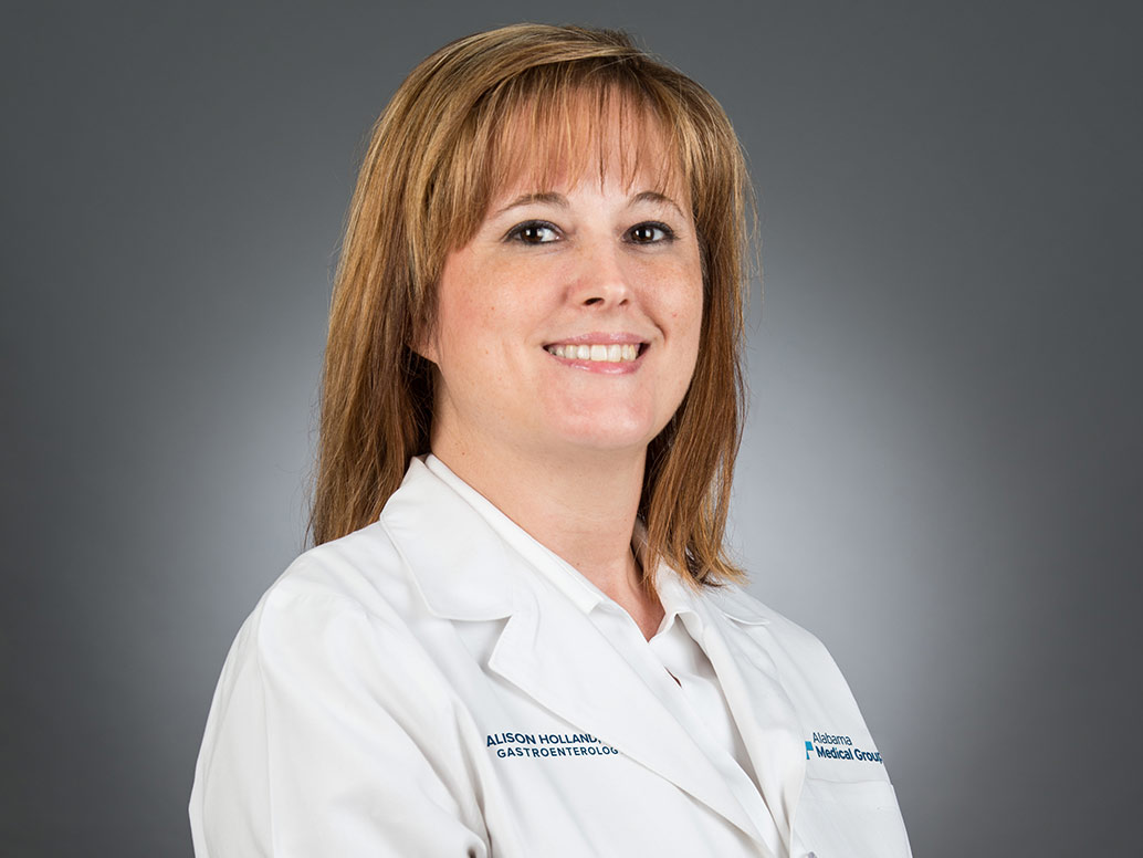 Picture of Alison Holland, CRNP in white lab coat