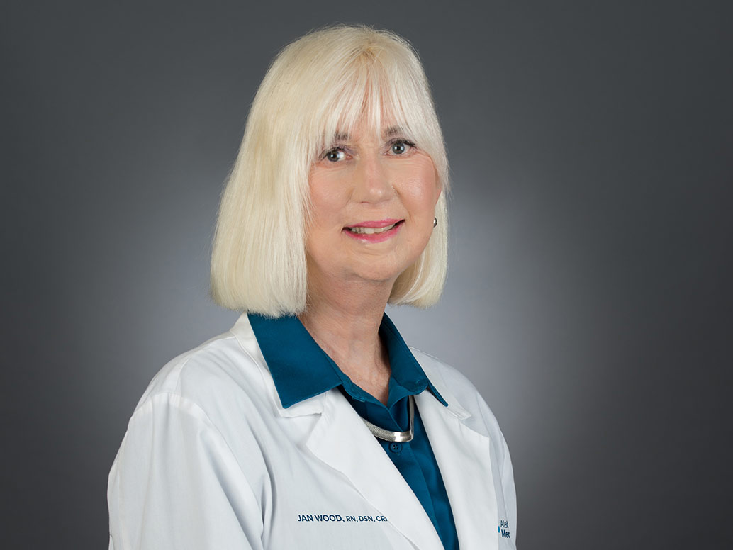 Picture of Jan Wood, RN, DSN, CRNP in white lab coat