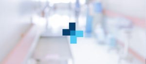 Picture of Alabama Medical Group blue cross logo over a blurred out image