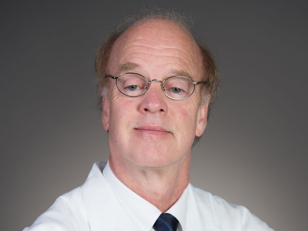 Picture of Patrick E. Nolan, M.D. in white lab coat and tie