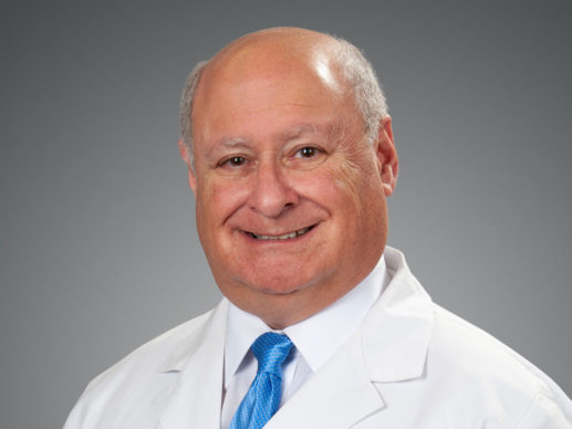 picture of Howard J. Rubenstein, M.D. in white lab coat and light blue tie