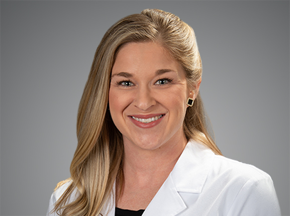 Picture of Alexandra Mattox, PA-C in white lab coat